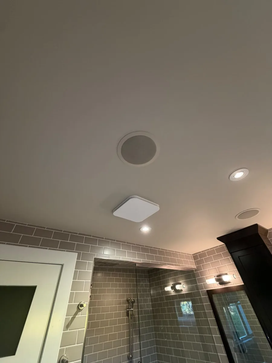Bathroom ceiling after drywall repair and fresh paint, Calgary