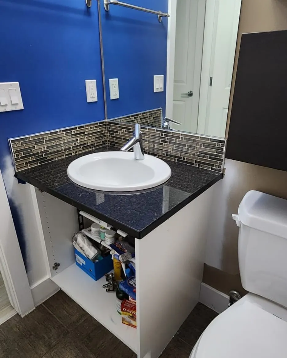 Bathroom vanity being sprayed with lacquer in Calgary