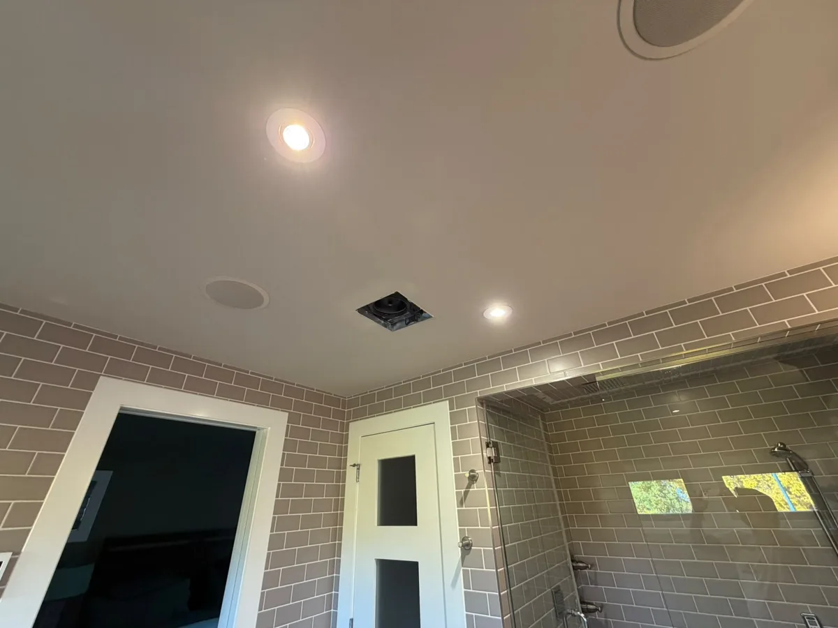 Bathroom ceiling with vent opening exposed during drywall repair, Calgary