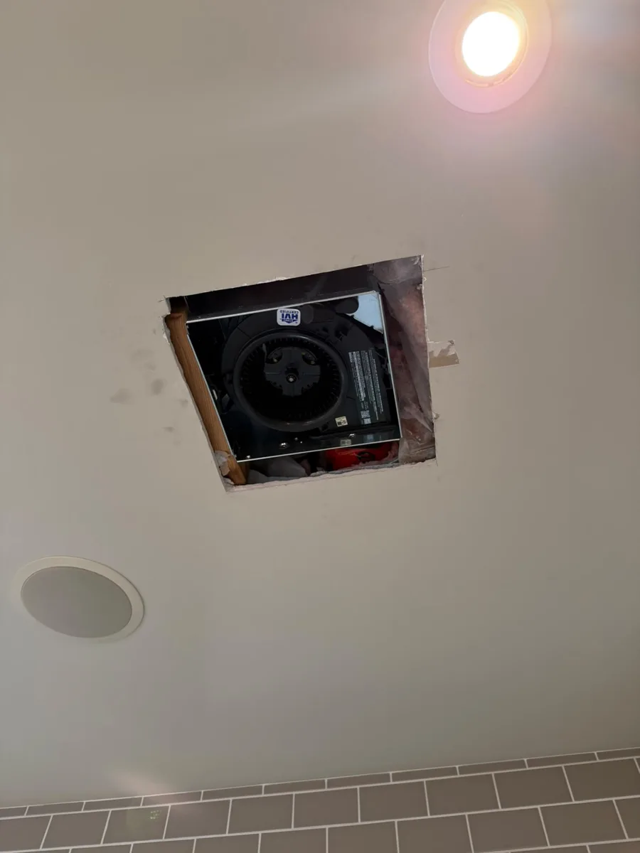 Close-up of ceiling vent opening before drywall patching, Calgary