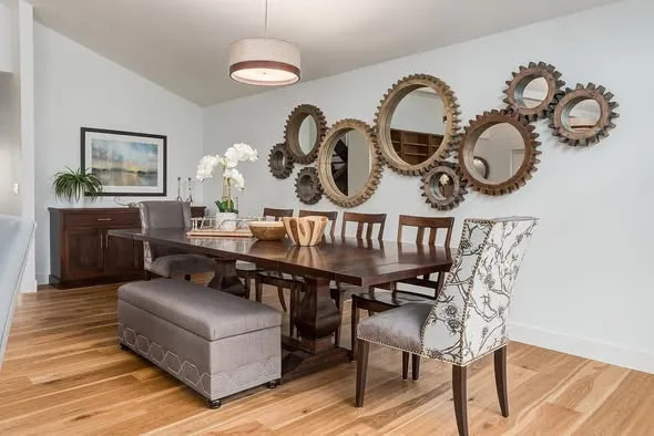 Dining room with fresh paint and decorative mirrors in Calgary