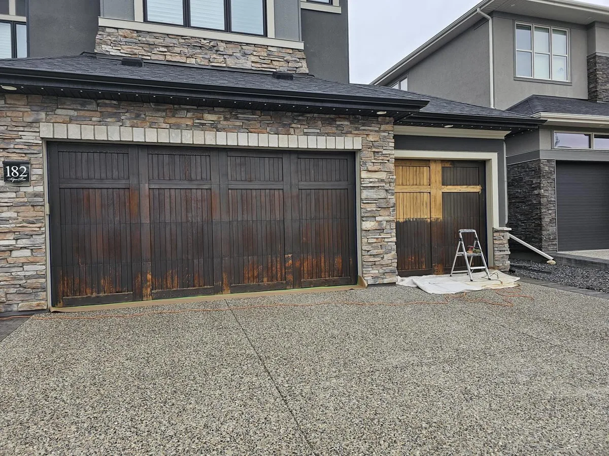 Garage door painted in Cordovan Brown (Benjamin Moore Arborcoat), Calgary