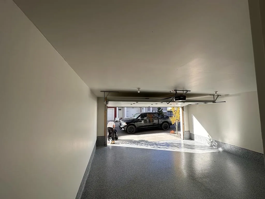 Finished garage interior with fresh paint, clean and bright, Calgary