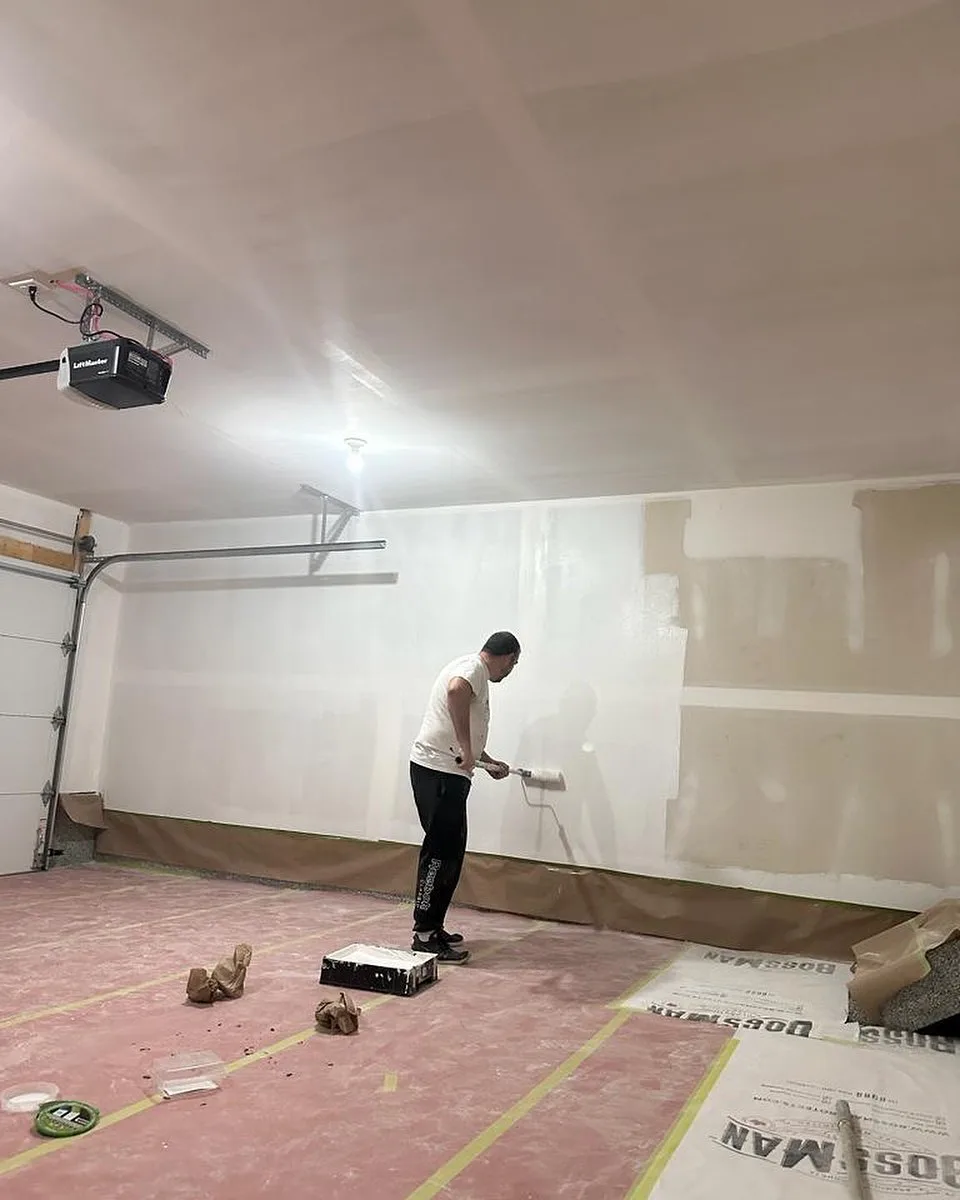 Garage interior walls during the painting process, Calgary