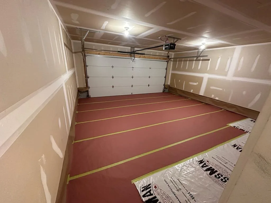 Garage interior prepped and masked, ready for paint, Calgary