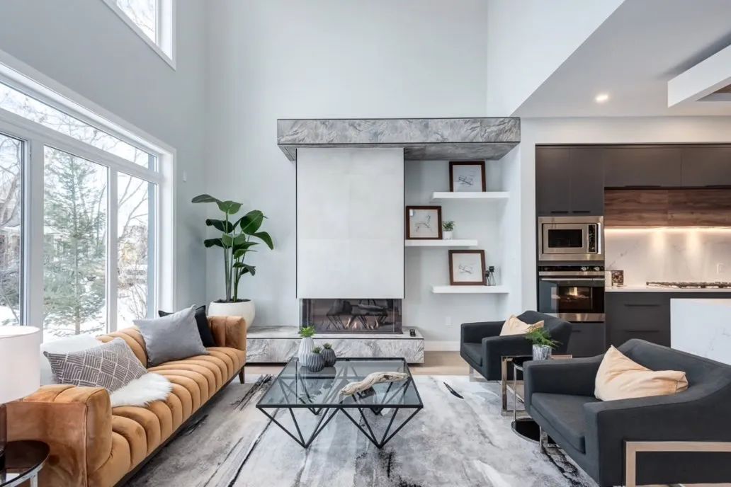 Living room with fresh paint and stone fireplace in Calgary