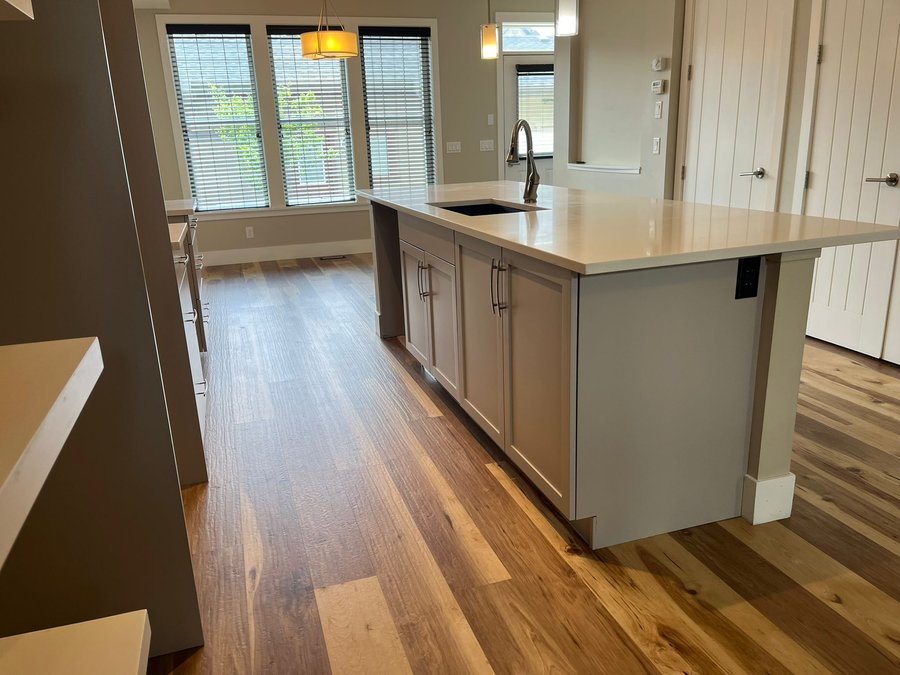 Kitchen island refinished in a light warm off-white
