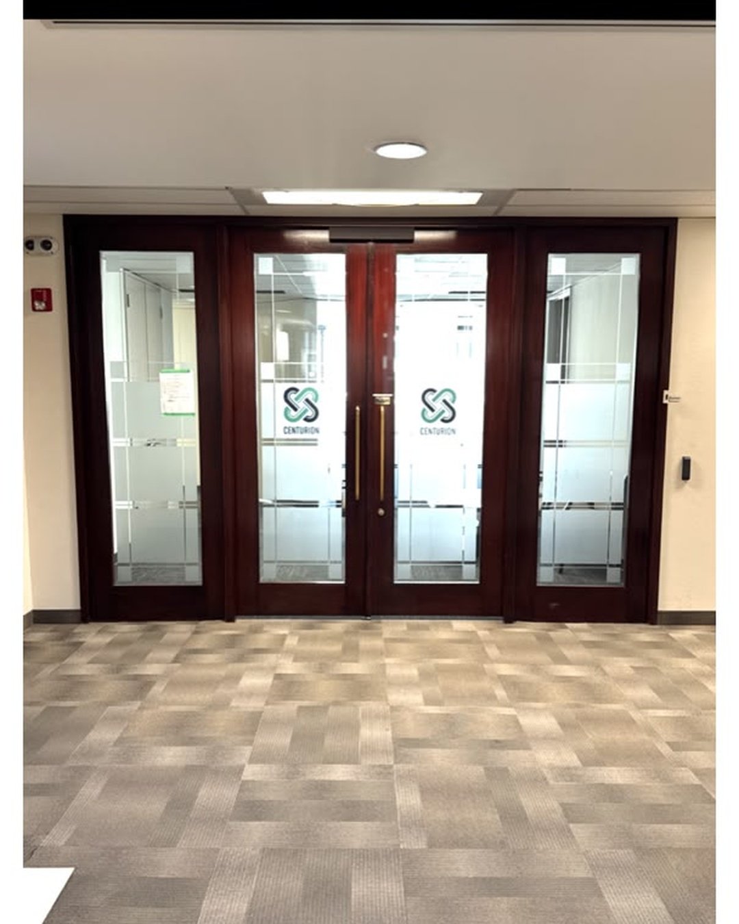 Commercial door refinishing in Downtown Calgary — includes video walkthroughs.