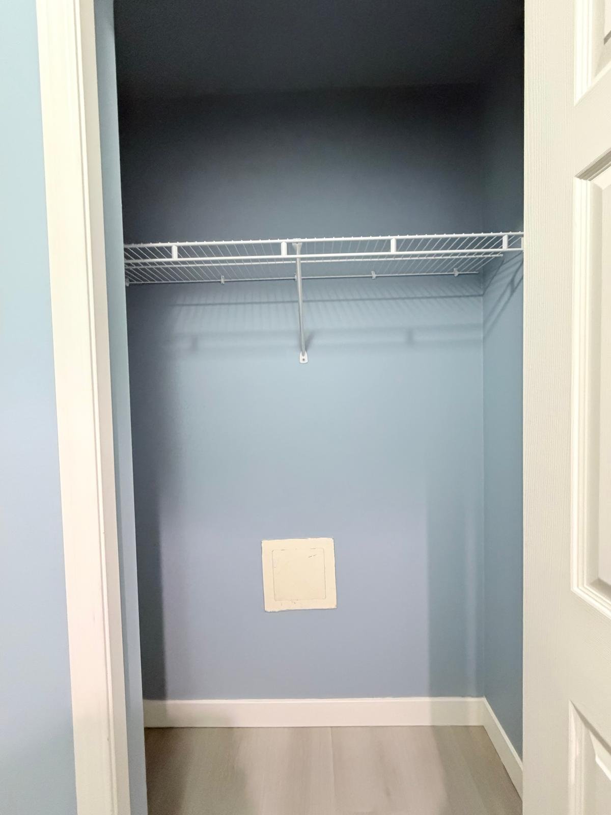 Repainted closet interior in an Evergreen condo, Calgary