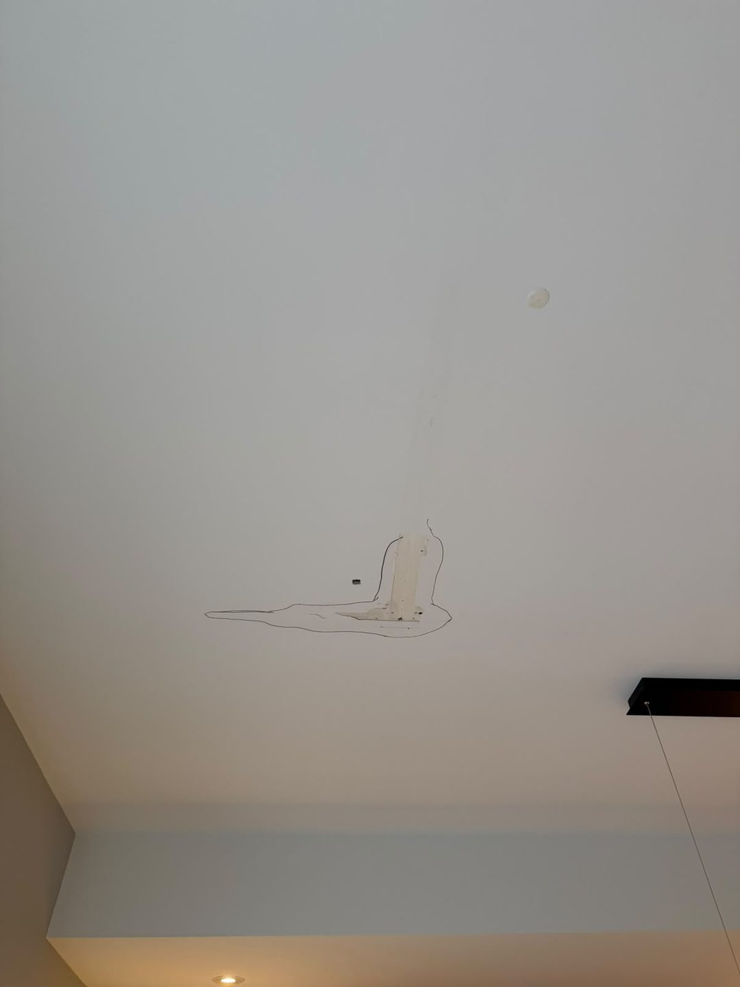 Water-damaged ceiling area marked for removal in Mount Pleasant, Calgary