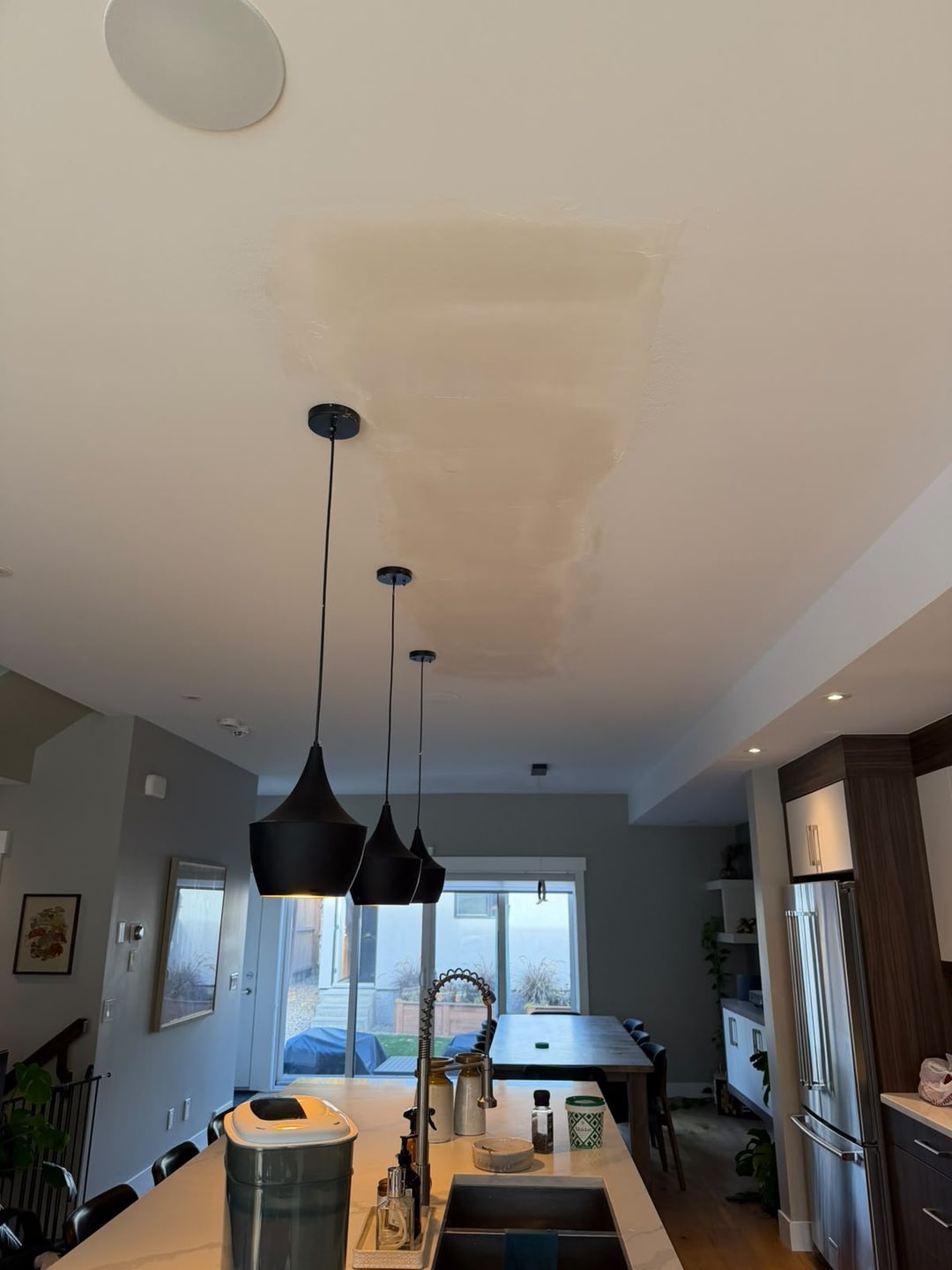 Sanded and primed ceiling patch in a kitchen in Mount Pleasant, Calgary