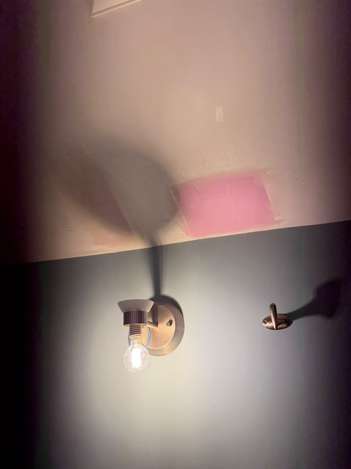 Filler applied over the taped repair on a bathroom ceiling in Oakridge, Calgary