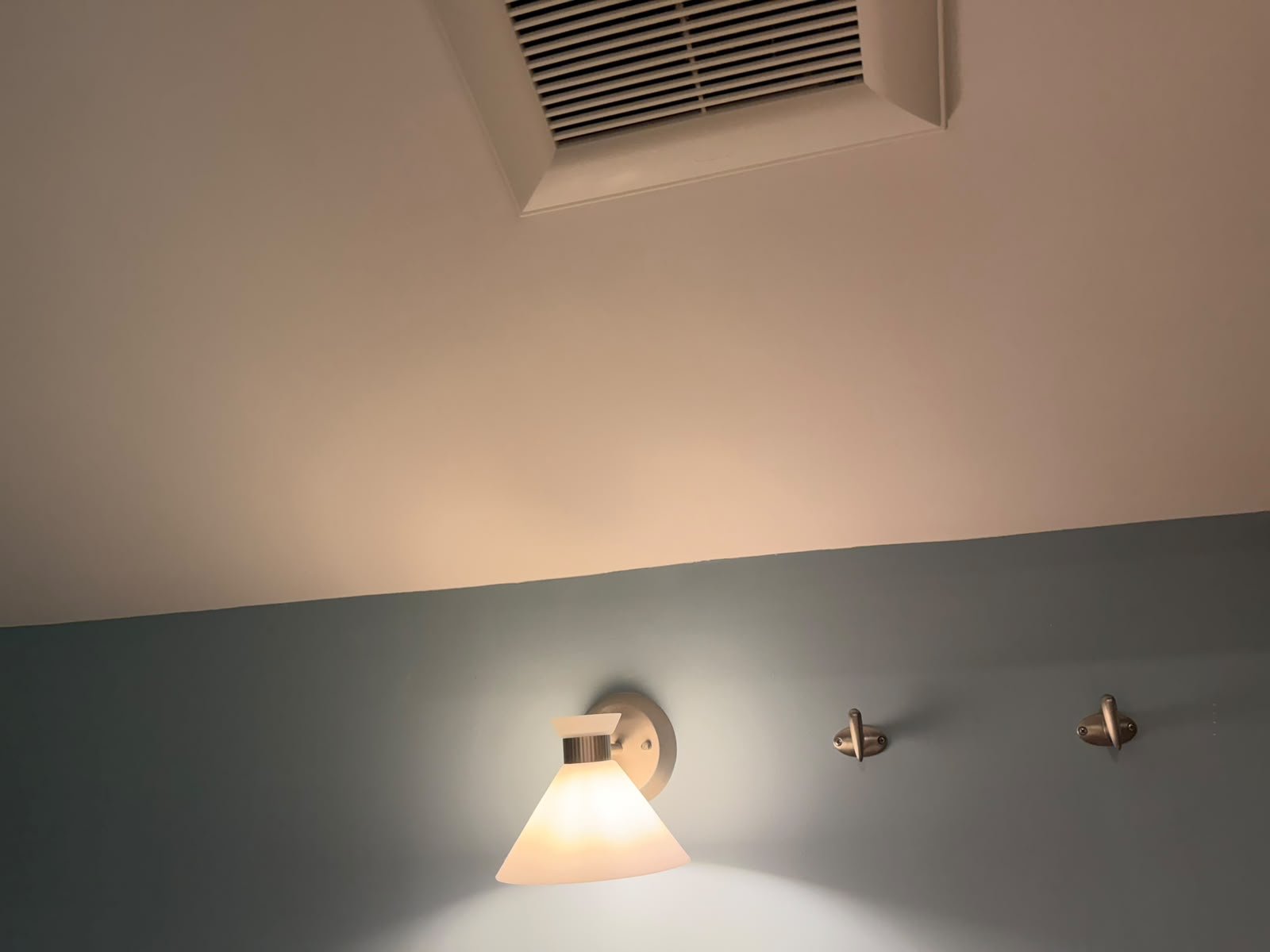 Finished repainted bathroom ceiling from another angle in Oakridge, Calgary