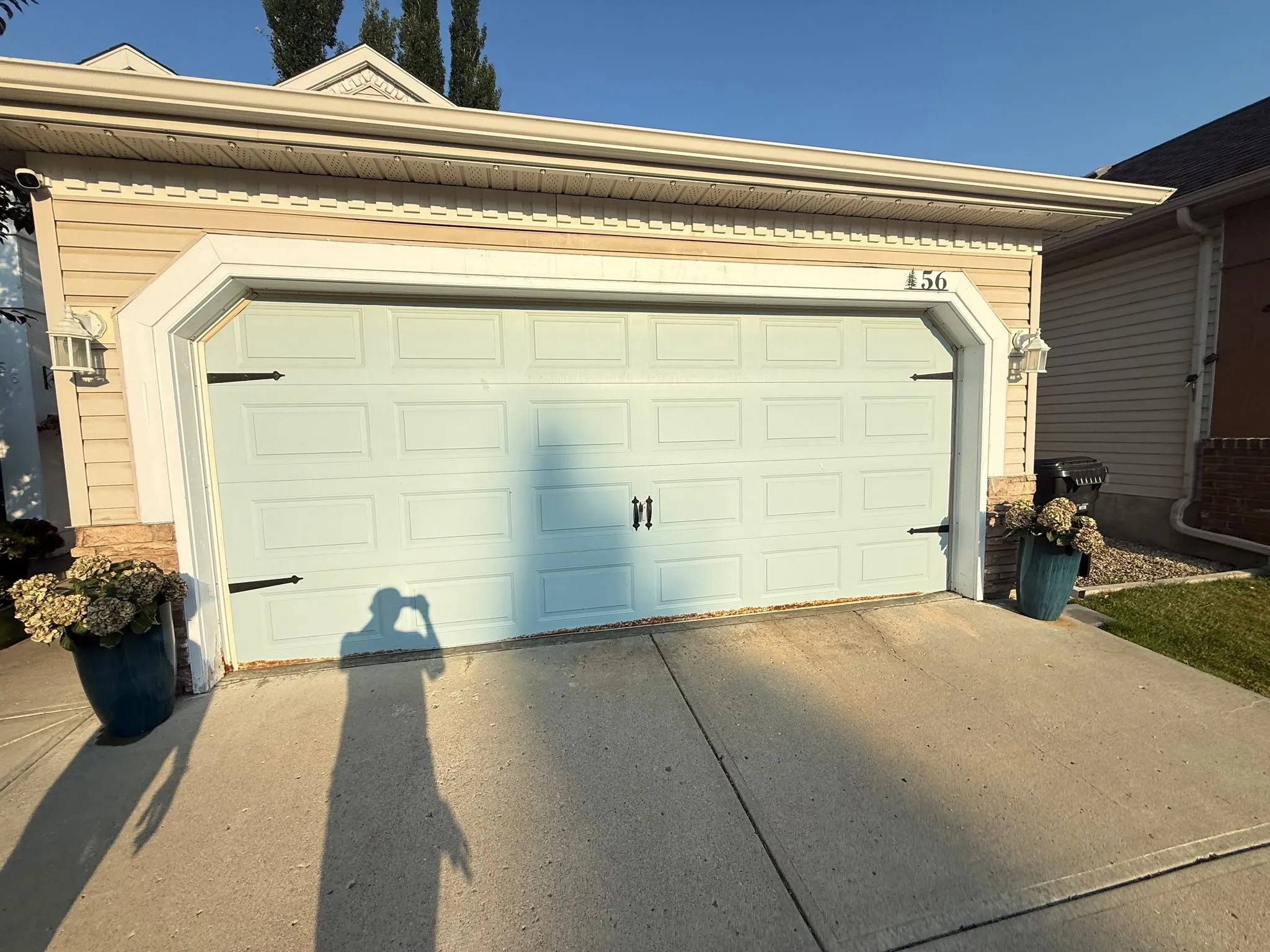 Repainted exterior trim on a home in Signal Hill, Calgary