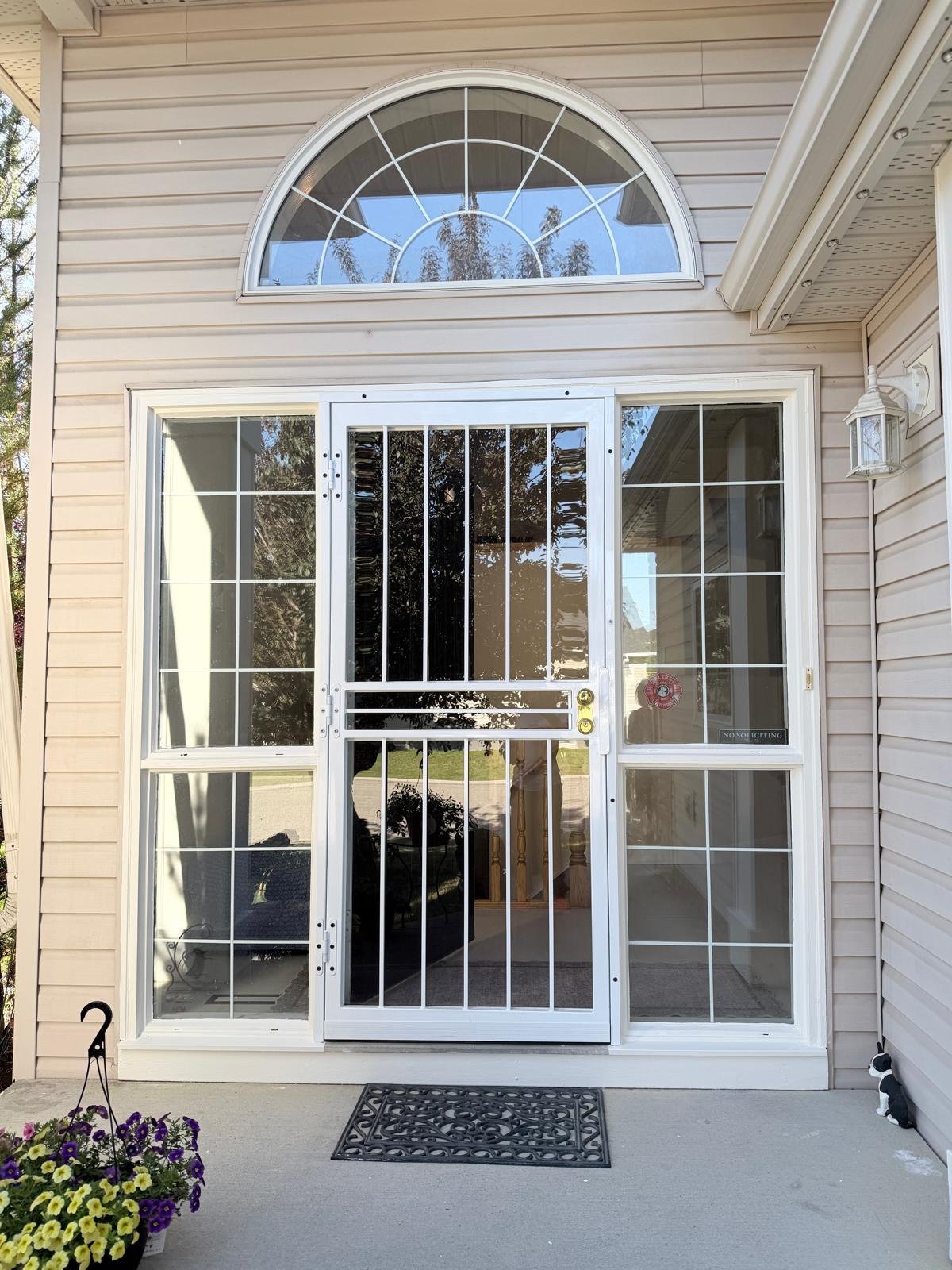 Repainted exterior trim on a home in Signal Hill, Calgary