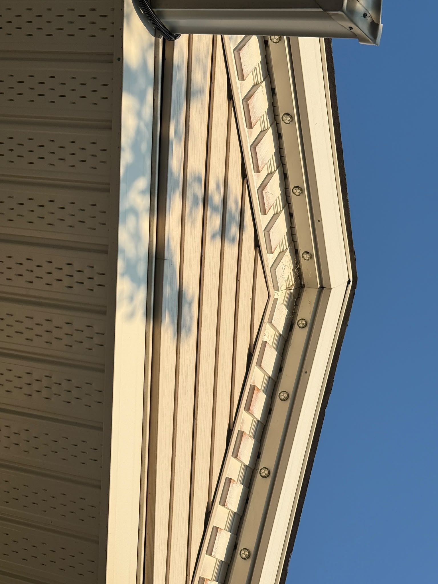 Repainted exterior trim on a home in Signal Hill, Calgary