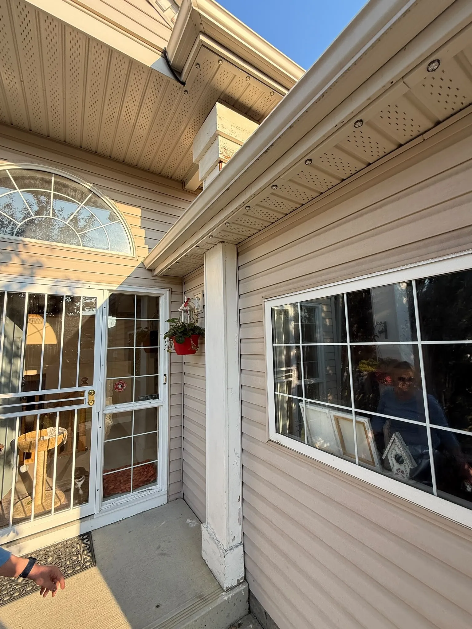 Repainted exterior trim on a home in Signal Hill, Calgary