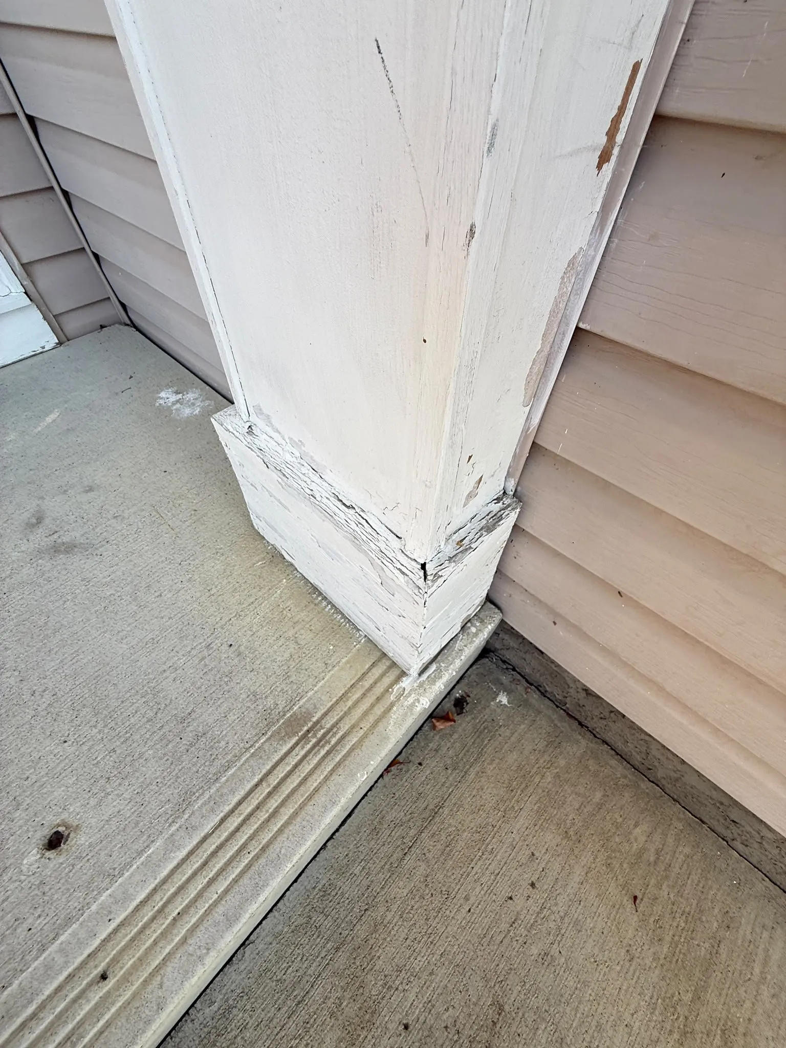Repainted exterior trim on a home in Signal Hill, Calgary