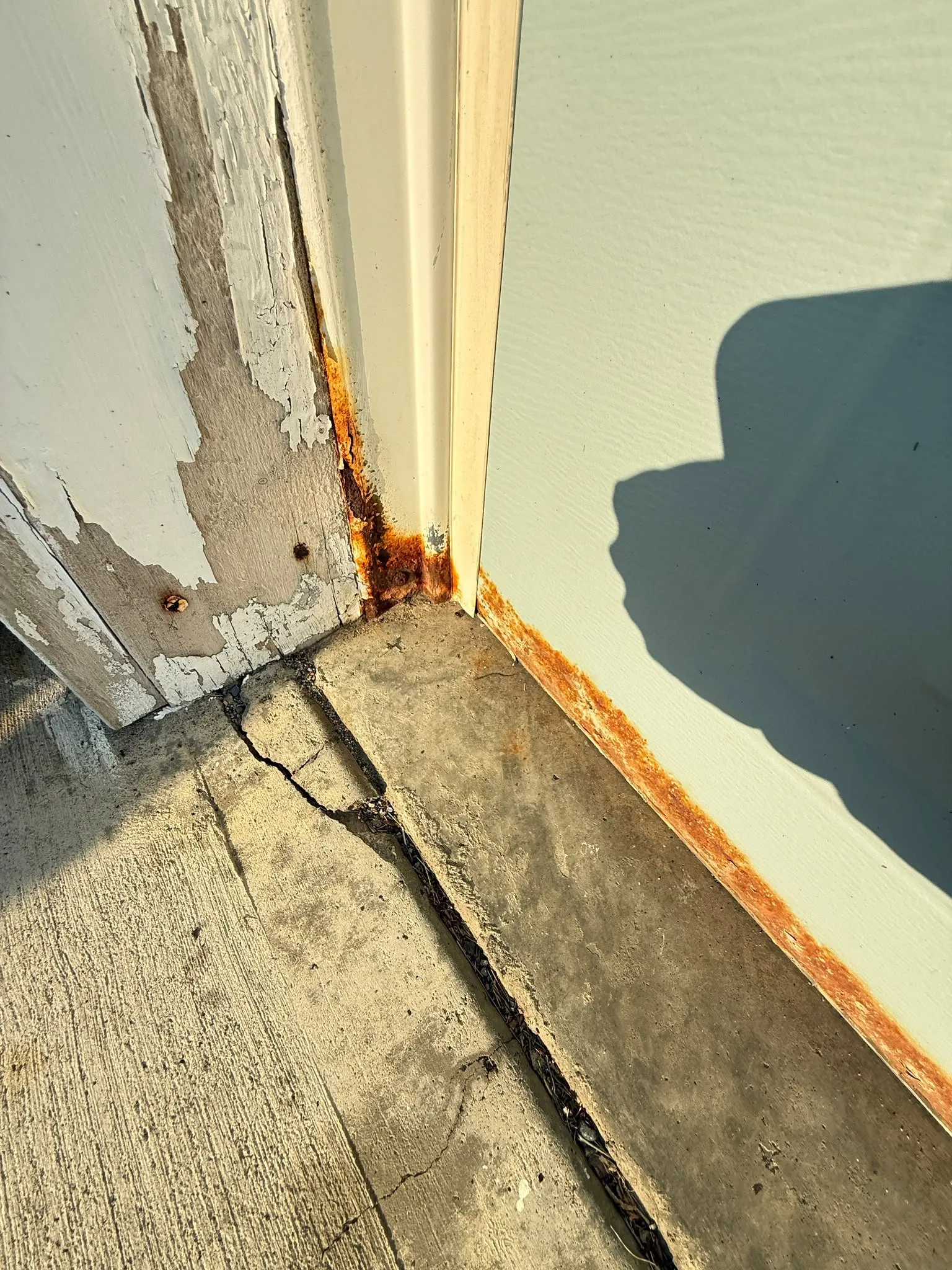 Repainted exterior trim on a home in Signal Hill, Calgary