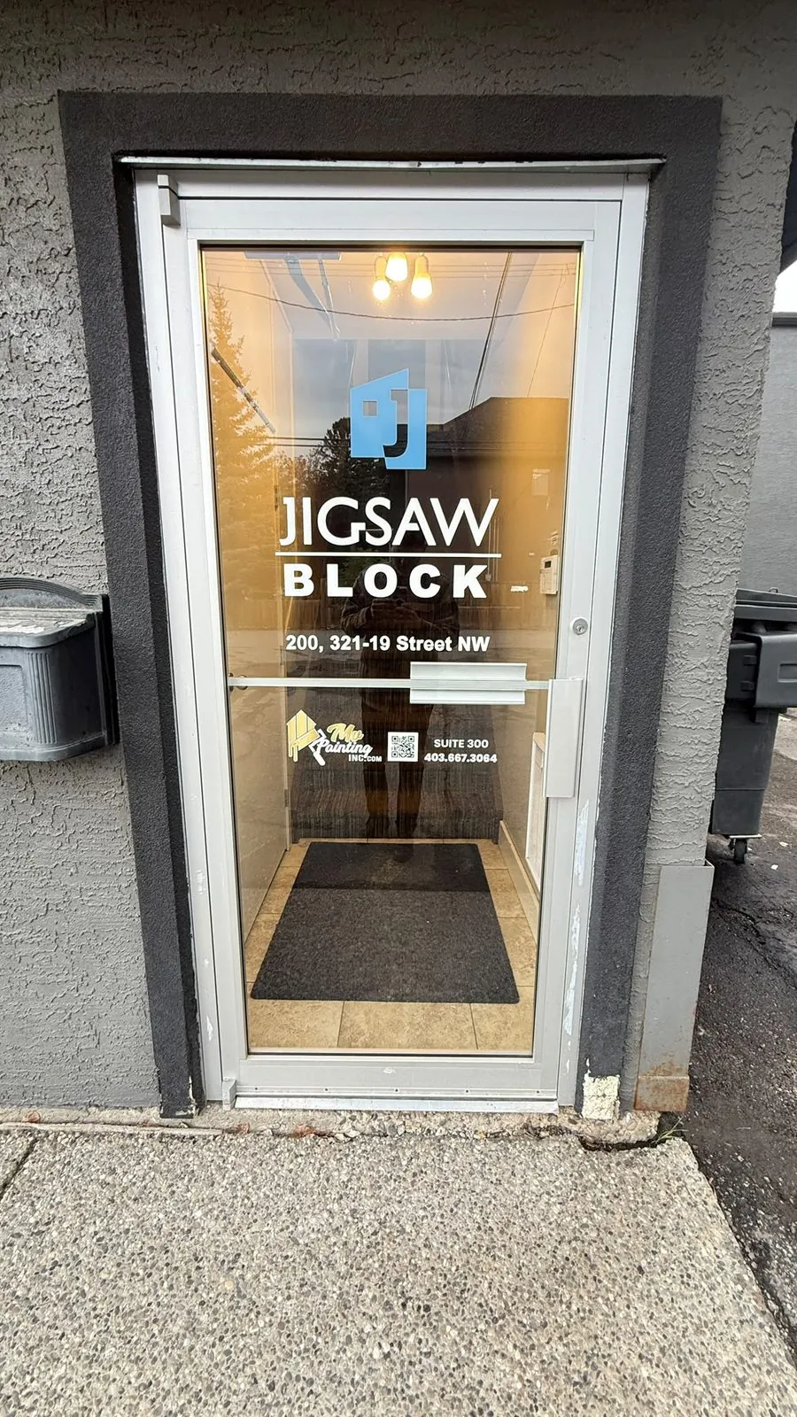Freshly painted office entrance by MV Painting Inc. in Calgary, Alberta